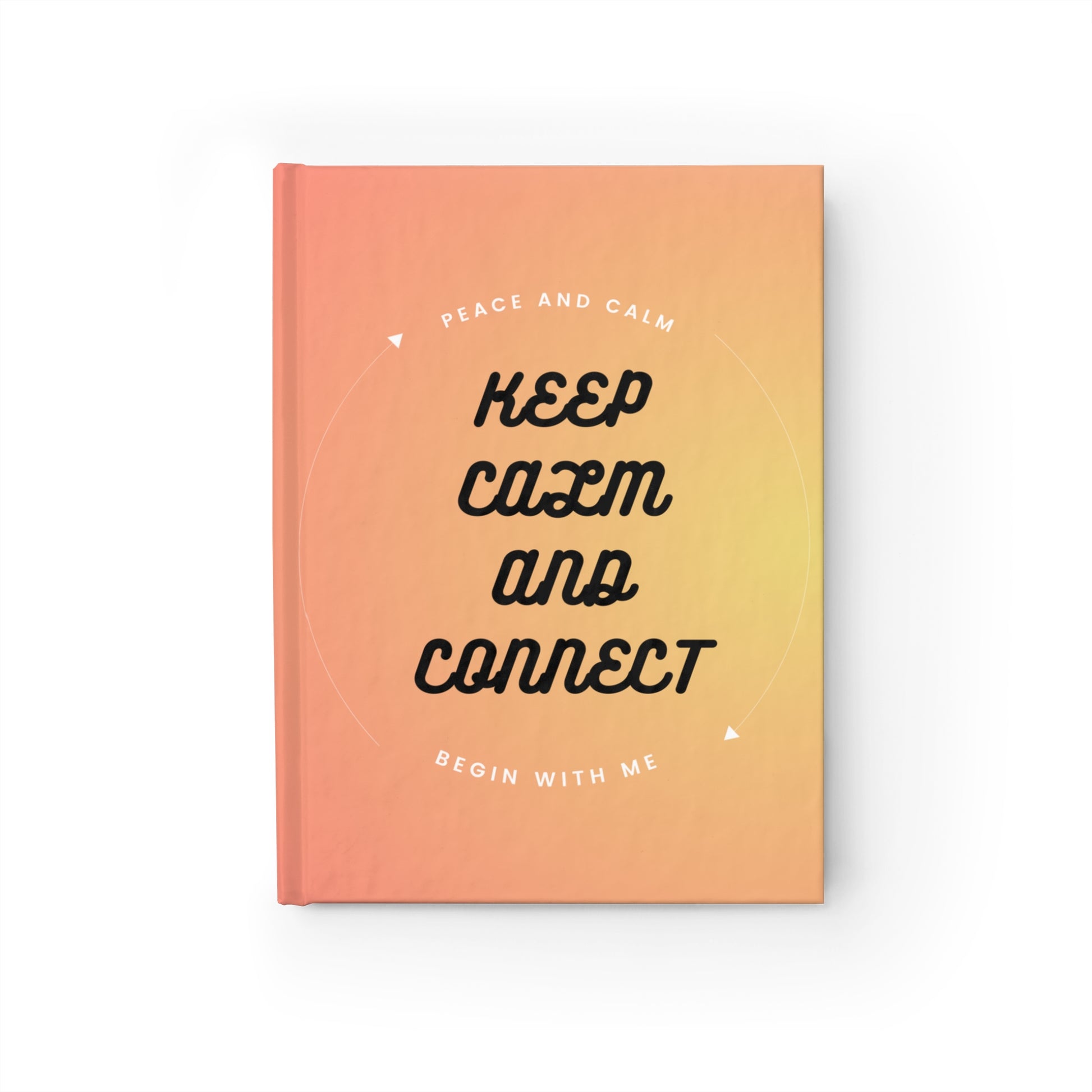 Notebook with a gradient cover from peach to orange, featuring text.